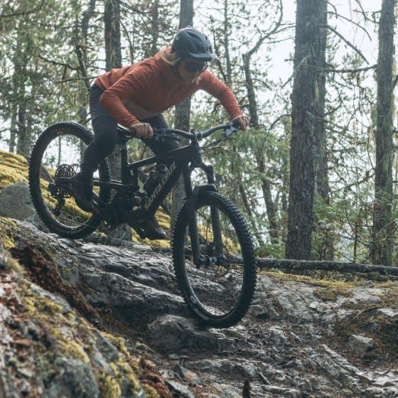 Woman on a bike in the mountain