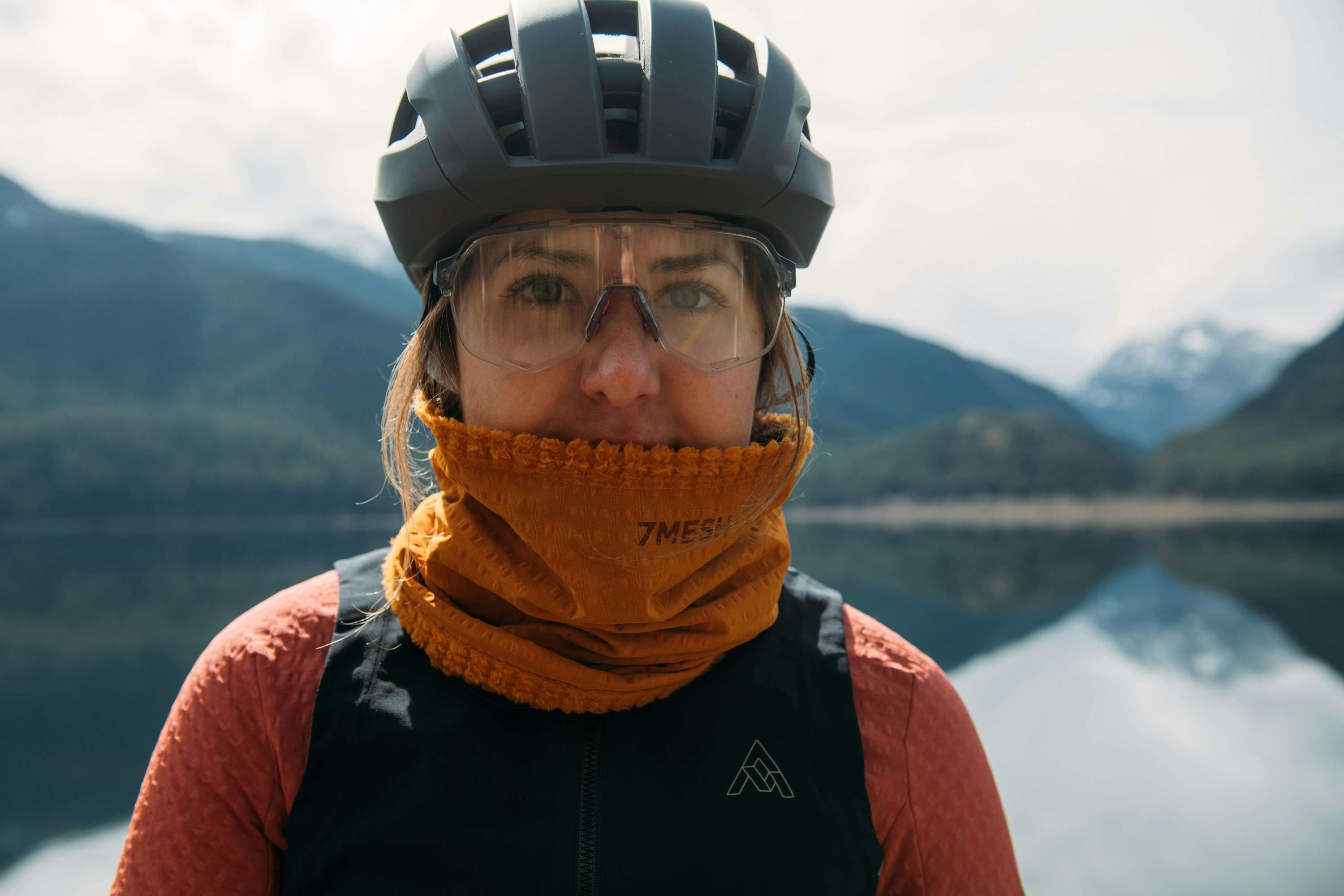 Woman wearing an orange neck warmer