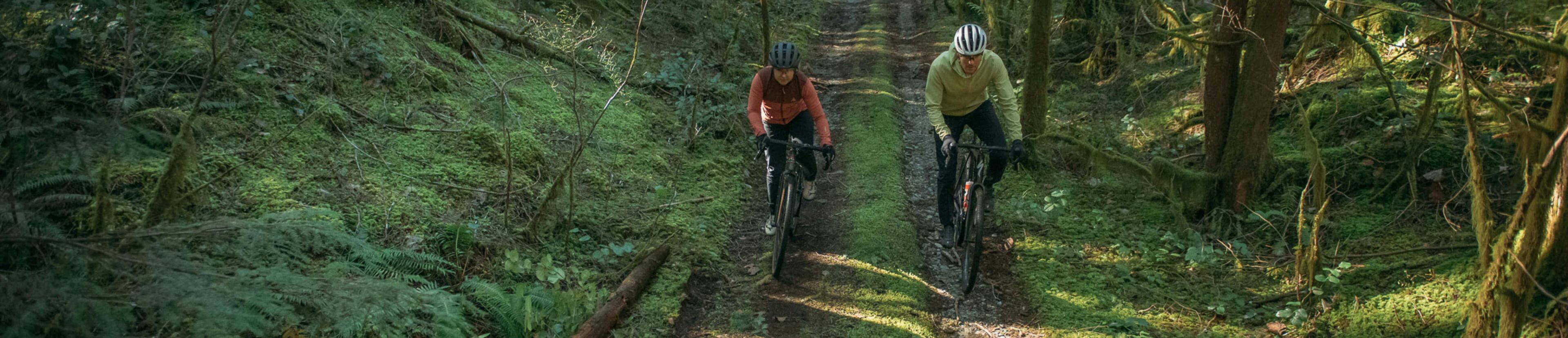 Man and woman riding a bike