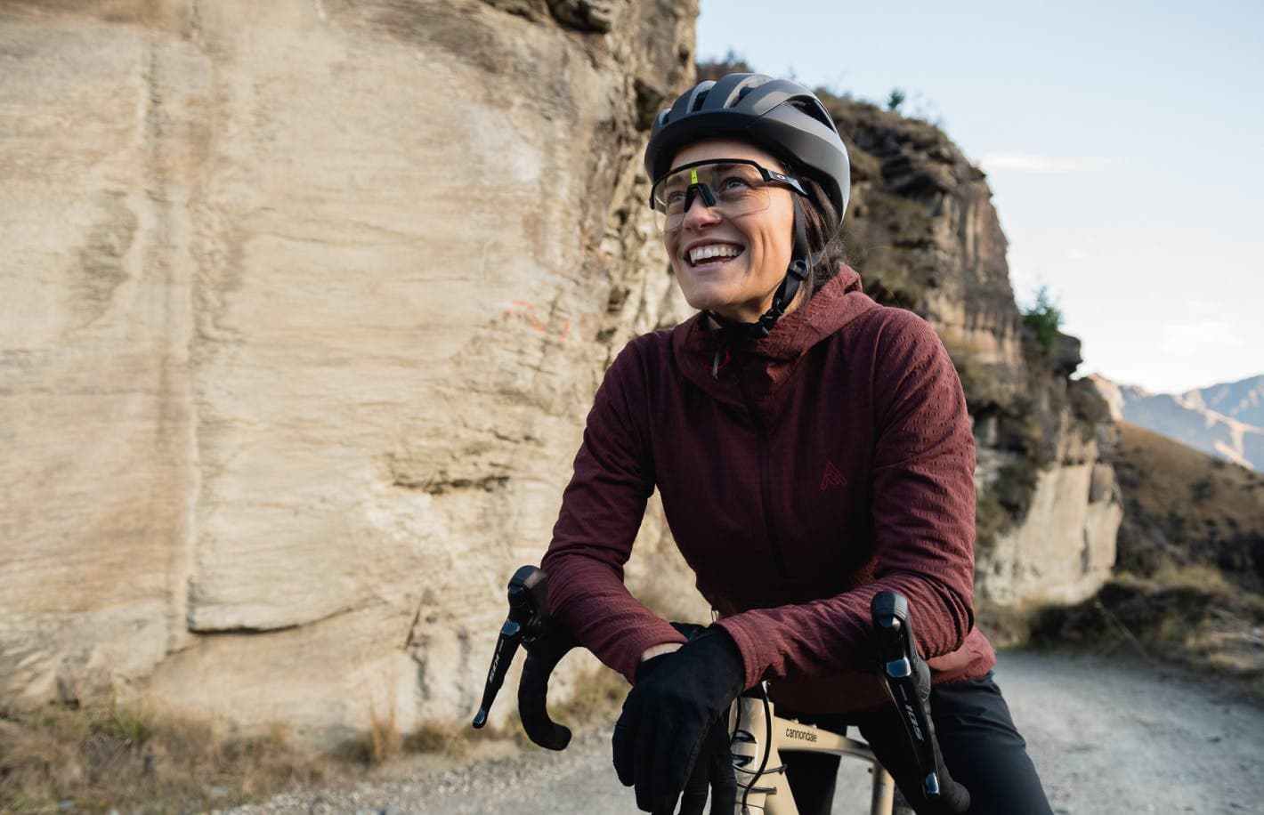 Woman on a bike wearing a helmet