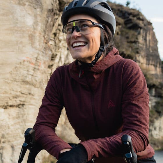 Woman on a bike wearing a helmet